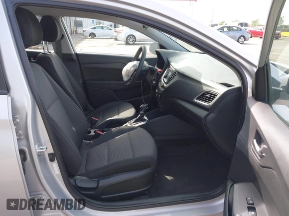 2022 Hyundai Accent SE with VIN 3KPC24A67NE167746, listed as a IAAI auction lot 42054225 with 25,883 mi miles and . Bid and sale history available at carsss.com. Image 5.