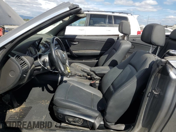 2009 BMW 1 Series 128i with VIN WBAUL73509VJ76763, listed as a Copart auction lot 66763214 with 83,954 mi miles and Salvage Title. Bid and sale history available at DreamBid. Image 7.