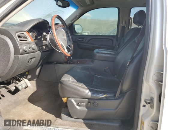 2009 Chevrolet Tahoe LTZ with VIN 1GNFK33059R217187, listed as a Copart auction lot 51563245 with 256,259 mi miles and Salvage title. Bid and sale history available at DreamBid. Image 7.
