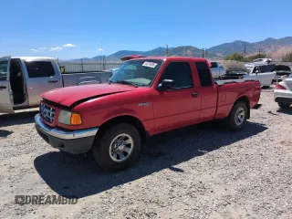 2001 Ford Ranger XL with VIN 1FTYR14V41PB76594, listed as a Copart auction lot 64274695 with 214,727 mi miles and Salvage title. Bid and sale history available at DreamBid. Image 1.