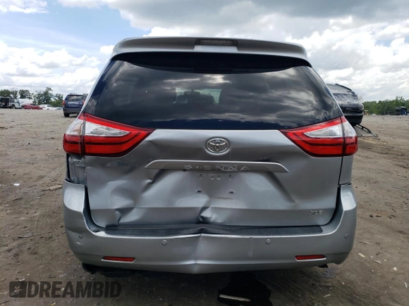 2015 Toyota Sienna XLE with VIN 5TDYK3DC0FS592251, listed as a Copart auction lot 60126165 with 118,925 mi miles and Salvage title. Bid and sale history available at DreamBid. Image 6.