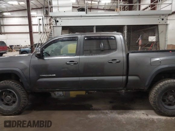 2017 Toyota Tacoma SR5 with VIN 3TMDZ5BN8HM016825, listed as a IAAI auction lot 41658400 with 166,098 mi miles. Bid and sale history available at carsss.com. Image 14.