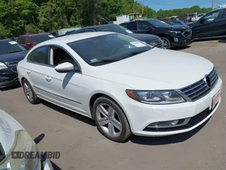 2014 Volkswagen CC R-Line z VIN WVWBP7AN5EE529218, wystawiony jako IAAI lot #42404851 z przebiegiem 164 775 mil mil oraz . Historia ofert i sprzedaży dostępna na DreamBid. Obrazek 1.