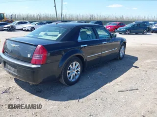 2006 Chrysler 300 C with VIN 2C3LA63H96H490736, listed as a IAAI auction lot 41998112 with 184,090 mi miles. Bid and sale history available at carsss.com. Image 4.