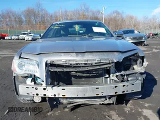2014 Chrysler 300 C with VIN 2C3CCAKG2EH273274, listed as a IAAI auction lot 41638665 with 164,888 mi miles and . Bid and sale history available at carsss.com. Image 6.