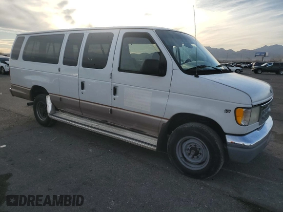 2000 Ford Econoline Passenger XL with VIN 1FBSS31L5YHA09064, listed as a Copart auction lot 84828844 with 257,973 mi miles and Salvage Title. Bid and sale history available at DreamBid. Image 4.