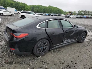 2024 BMW i4 eDrive35 with VIN WBY43AW05RFS84773, listed as a Copart auction lot 54974024 with 2,942 mi miles and Salvage Title. Bid and sale history available at carsss.com. Image 3.