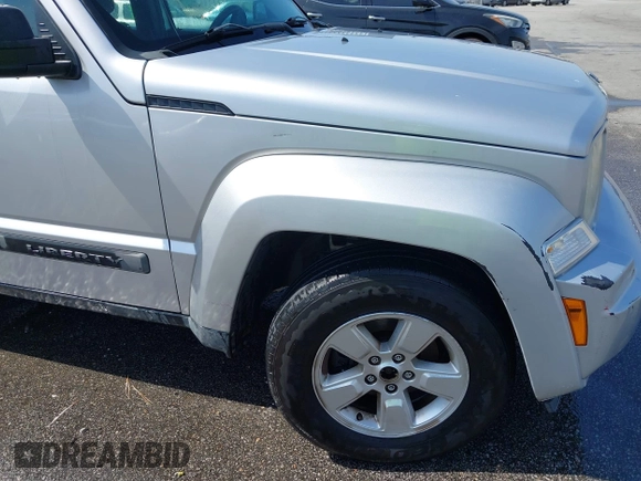 2011 Jeep Liberty Sport Jet with VIN 1J4PN2GK1BW566617, listed as a IAAI auction lot 41789607 with 225,536 mi miles. Bid and sale history available at carsss.com. Image 13.
