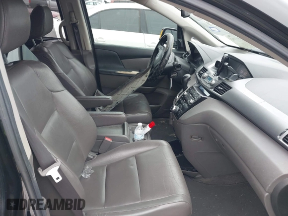 2013 Honda Odyssey Touring with VIN 5FNRL5H9XDB073706, listed as a IAAI auction lot 41591111 with 158,305 mi miles and . Bid and sale history available at carsss.com. Image 5.