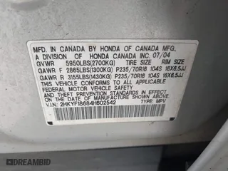 2004 Honda Pilot EX with VIN 2HKYF18684H602542, listed as a IAAI auction lot 42116418 with 240,737 mi miles. Bid and sale history available at carsss.com. Image 9.