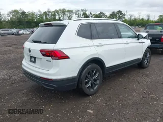 2022 Volkswagen Tiguan SE z VIN 3VV2B7AX8NM109450, wystawiony jako IAAI lot #42248707 z przebiegiem 18 603 mil mil oraz . Historia ofert i sprzedaży dostępna na DreamBid. Obrazek 4.