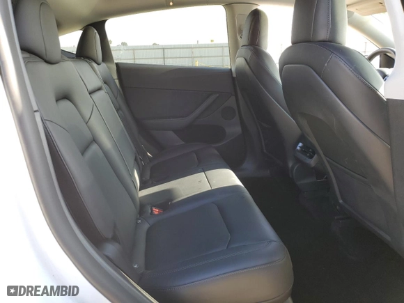 2022 Tesla Model Y Long Range with VIN 7SAYGDEE1NF559238, listed as a Copart auction lot 86744664 with 59,074 mi miles and Salvage Title. Bid and sale history available at carsss.com. Image 10.