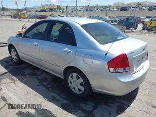 2009 Kia Spectra EX z VIN KNAFE221295647610, wystawiony jako IAAI lot #42358753 z przebiegiem 220 168 mil mil oraz . Historia ofert i sprzedaży dostępna na DreamBid. Obrazek 3.