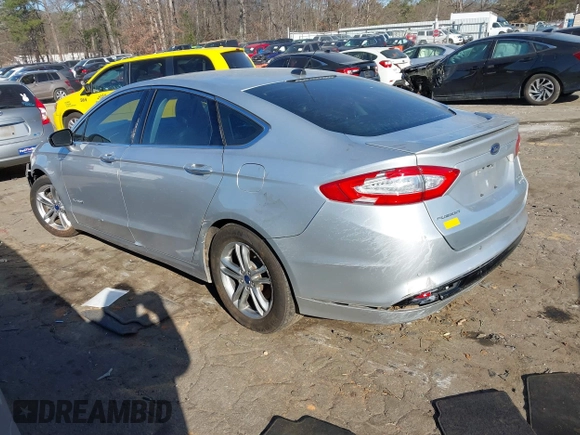 2016 Ford Fusion Titanium Hybrid with VIN 3FA6P0RU7GR364573, listed as a IAAI auction lot 41298298 with 189,900 mi miles. Bid and sale history available at carsss.com. Image 3.