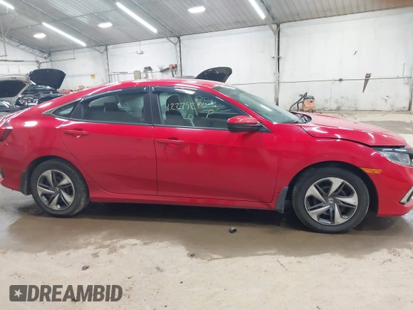 2020 Honda Civic LX with VIN 2HGFC2F6XLH551000, listed as a IAAI auction lot 42279270 with 76,134 mi miles and . Bid and sale history available at DreamBid. Image 13.