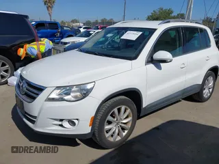 2011 Volkswagen Tiguan SEL with VIN WVGBV7AXXBW554267, listed as a IAAI auction lot 42773354 with 70,547 mi miles and . Bid and sale history available at DreamBid. Image 2.
