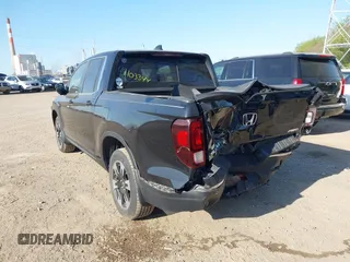 2020 Honda Ridgeline RTL with VIN 5FPYK3F52LB024816, listed as a IAAI auction lot 42103344 with 68,700 mi miles and . Bid and sale history available at DreamBid. Image 3.