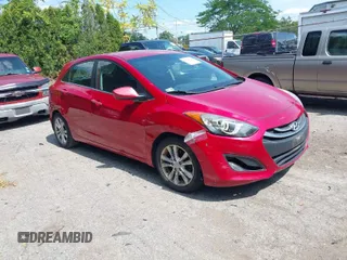 2014 Hyundai Elantra GT with VIN KMHD35LH9EU234401, listed as a IAAI auction lot 39942729 with 122,894 mi miles. Bid and sale history available at carsss.com. Image 1.