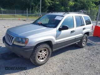 2004 Jeep Grand Cherokee Laredo with VIN 1J4GW48S84C116717, listed as a IAAI auction lot 42568586 with 228,233 mi miles and . Bid and sale history available at DreamBid. Image 2.