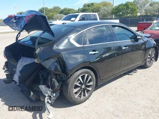 2018 Nissan Altima S with VIN 1N4AL3AP8JC109000, listed as a IAAI auction lot 41669061 with 238,560 mi miles and . Bid and sale history available at DreamBid. Image 4.