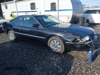 1999 Cadillac Eldorado Touring with VIN 1G6ET129XXU603042, listed as a IAAI auction lot 41699955 with 81,704 mi miles and . Bid and sale history available at DreamBid. Image 1.