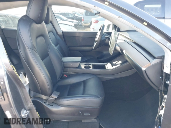 2021 Tesla Model Y Long Range with VIN 5YJYGDEE5MF191142, listed as a IAAI auction lot 41448514 with 71,626 mi miles. Bid and sale history available at carsss.com. Image 5.