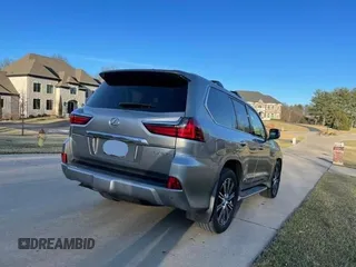 2020 Lexus LX with VIN JTJDY7AX7L4332820, listed as a Copart auction lot 52223565 with 102,417 mi miles and Clean Title. Bid and sale history available at carsss.com. Image 4.