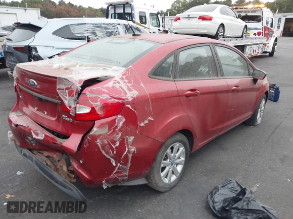 2012 Ford Fiesta SE with VIN 3FADP4BJ1CM145114, listed as a IAAI auction lot 40446295 with 169,529 mi miles. Bid and sale history available at carsss.com. Image 4.