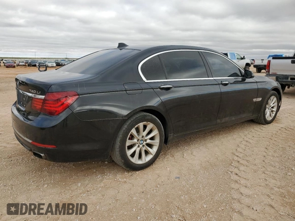 2015 BMW 7 Series 740Li xDrive with VIN WBAYF4C50FGS99289, listed as a Copart auction lot 79809474 with 128,993 mi miles and Salvage Title. Bid and sale history available at carsss.com. Image 3.