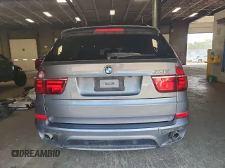 2012 BMW X5 35i z VIN 5UXZV4C58CL758466, wystawiony jako Copart lot #59799955 z przebiegiem 119 331 mil mil oraz Nie do naprawy • Non repairable. Historia ofert i sprzedaży dostępna na DreamBid. Obrazek 6.