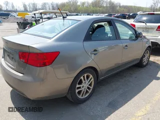 2011 Kia Forte EX with VIN KNAFU4A22B5405396, listed as a IAAI auction lot 42125381 with 209,300 mi miles. Bid and sale history available at carsss.com. Image 4.