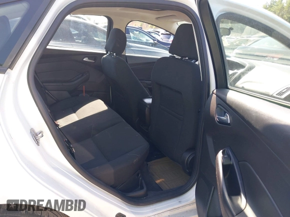 2016 Ford Focus SE with VIN 1FADP3F21GL273440, listed as a IAAI auction lot 42097390 with 131,781 mi miles and . Bid and sale history available at DreamBid. Image 8.