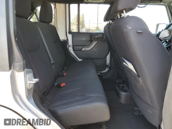 2014 Jeep Wrangler Unlimited Sport with VIN 1C4HJWDG1EL221302, listed as a Copart auction lot 63331015 with 213,912 mi miles and Salvage title. Bid and sale history available at DreamBid. Image 11.