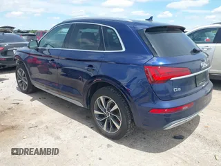 2021 Audi Q5 Premium with VIN WA1AAAFY7M2004975, listed as a IAAI auction lot 42190283 with 56,810 mi miles and . Bid and sale history available at DreamBid. Image 3.
