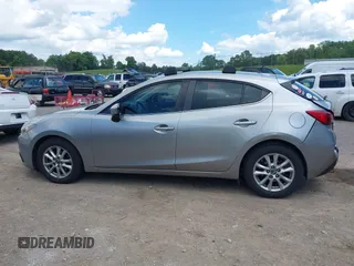 2014 Mazda 3 i Touring z VIN JM1BM1L70E1101262, wystawiony jako IAAI lot #42205168 z przebiegiem 152 069 mil mil oraz . Historia ofert i sprzedaży dostępna na DreamBid. Obrazek 14.