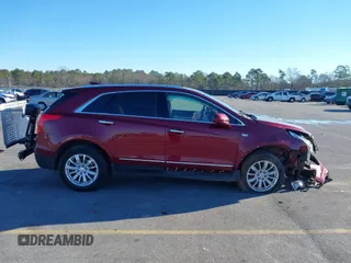 2018 Cadillac XT5 FWD with VIN 1GYKNARS4JZ211455, listed as a IAAI auction lot 41257536 with 102,032 mi miles and . Bid and sale history available at DreamBid. Image 12.