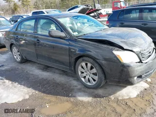2005 Toyota Avalon XL with VIN 4T1BK36B65U006636, listed as a IAAI auction lot 41641306 with 157,586 mi miles. Bid and sale history available at carsss.com. Image 1.