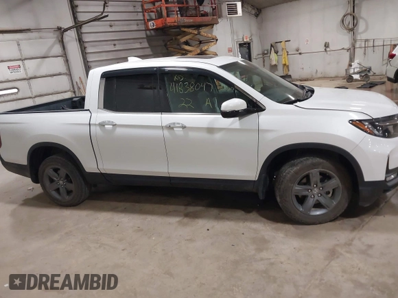 2022 Honda Ridgeline RTL-E z VIN 5FPYK3F76NB033832, wystawiony jako IAAI lot #41838047 z przebiegiem 16 497 mil mil oraz . Historia ofert i sprzedaży dostępna na DreamBid. Obrazek 14.