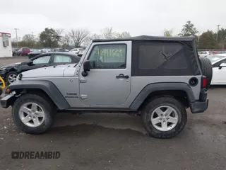 2015 Jeep Wrangler Sport with VIN 1C4AJWAG6FL501160, listed as a IAAI auction lot 41941661 with 134,842 mi miles. Bid and sale history available at carsss.com. Image 14.