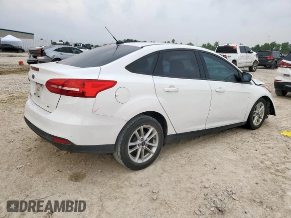 2018 Ford Focus SE with VIN 1FADP3F23JL246375, listed as a Copart auction lot 56539005 with 83,130 mi miles and Salvage title. Bid and sale history available at DreamBid. Image 3.