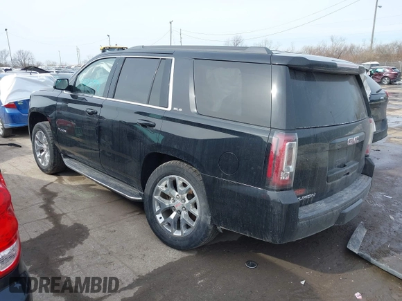 2016 GMC Yukon SLE with VIN 1GKS2AKC3GR398556, listed as a IAAI auction lot 41585972 with 130,961 mi miles. Bid and sale history available at carsss.com. Image 3.
