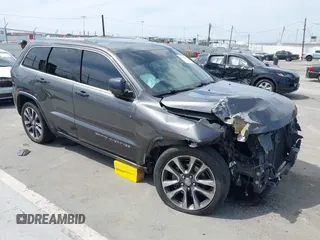 2018 Jeep Grand Cherokee Limited z VIN 1C4RJEBGXJC460391, wystawiony jako IAAI lot #42047187 z przebiegiem 61 320 mil mil oraz . Historia ofert i sprzedaży dostępna na DreamBid. Obrazek 1.
