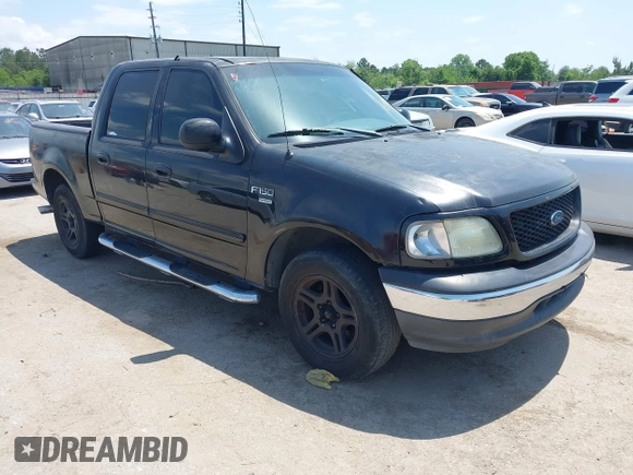2002 Ford F-150 XLT with VIN 1FTRW07602KD37873, listed as a IAAI auction lot 42048067 with 1 mi miles. Bid and sale history available at carsss.com. Image 1.