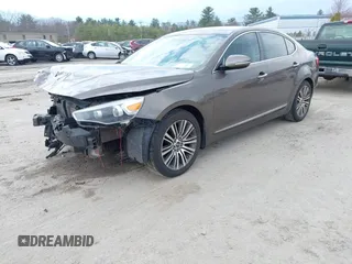 2014 Kia Cadenza Premium with VIN KNALN4D74E5164291, listed as a IAAI auction lot 42013820 with 140,765 mi miles and . Bid and sale history available at DreamBid. Image 2.