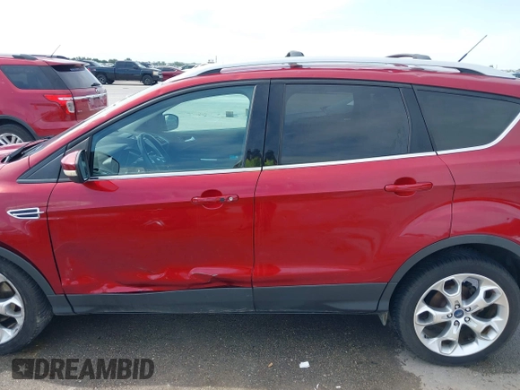 2013 Ford Escape Titanium with VIN 1FMCU0J98DUC93235, listed as a IAAI auction lot 42253289 with 107,030 mi miles and . Bid and sale history available at DreamBid. Image 14.