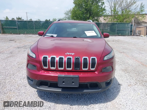2014 Jeep Cherokee Altitude with VIN 1C4PJMCB7EW185958, listed as a IAAI auction lot 42002583 with 118,256 mi miles and . Bid and sale history available at DreamBid. Image 12.