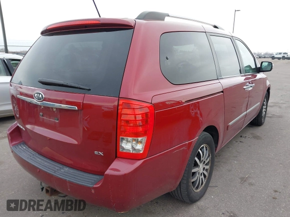 2012 Kia Sedona EX with VIN KNDMH4C76C6463143, listed as a IAAI auction lot 41990970 with 214,045 mi miles. Bid and sale history available at carsss.com. Image 4.
