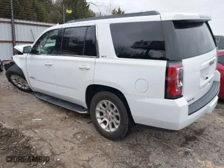 2019 GMC Yukon SLT with VIN 1GKS2BKC6KR183607, listed as a IAAI auction lot 41557880 with 120,971 mi miles. Bid and sale history available at carsss.com. Image 3.