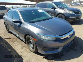 2017 Honda Civic Sedan LX with VIN 19XFC2F52HE065998, listed as a IAAI auction lot 41718165 with 112,292 mi miles. Bid and sale history available at carsss.com. Image 1.