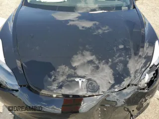 2023 Tesla Model 3 z VIN 5YJ3E1EA3PF713735, wystawiony jako Copart lot #51821995 z przebiegiem Nie podano mil oraz Szkoda całkowita • Salvage title. Historia ofert i sprzedaży dostępna na DreamBid. Obrazek 12.
